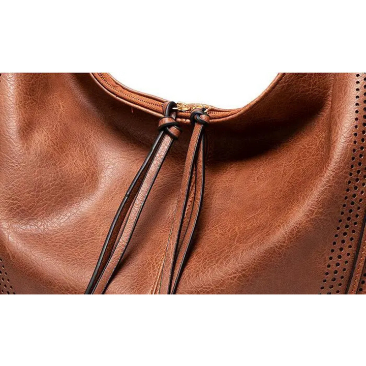 Jack Faelan | Minerva’s Classic Versatility Vintage Bag